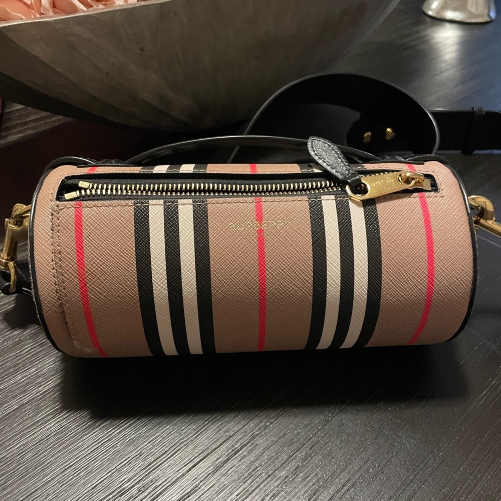 Burberry
The Icon Stripe E-canvas and Leather Barrel Bag